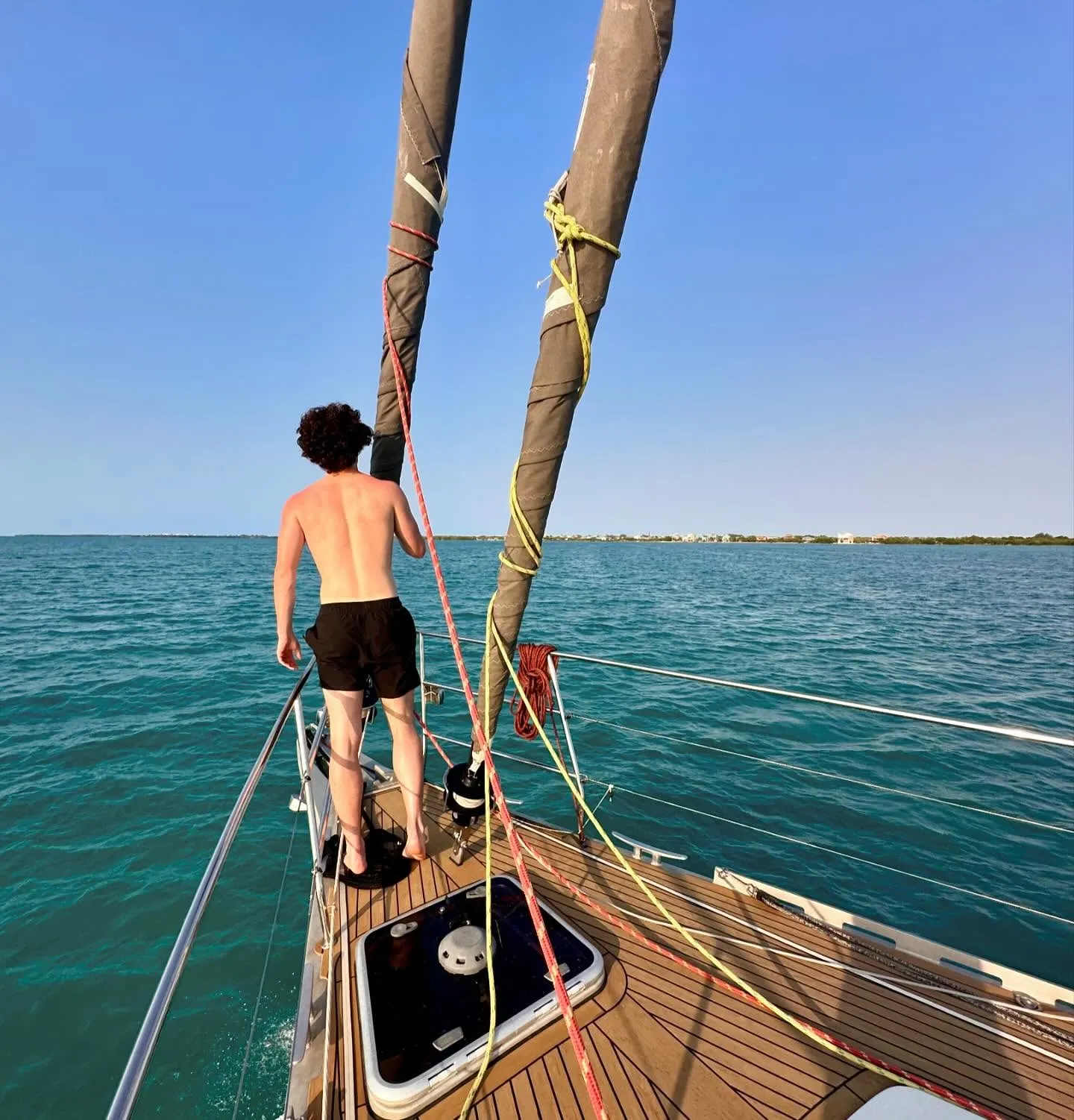 Up on the bow in turquoise water. Up on the bow in turquoise water.