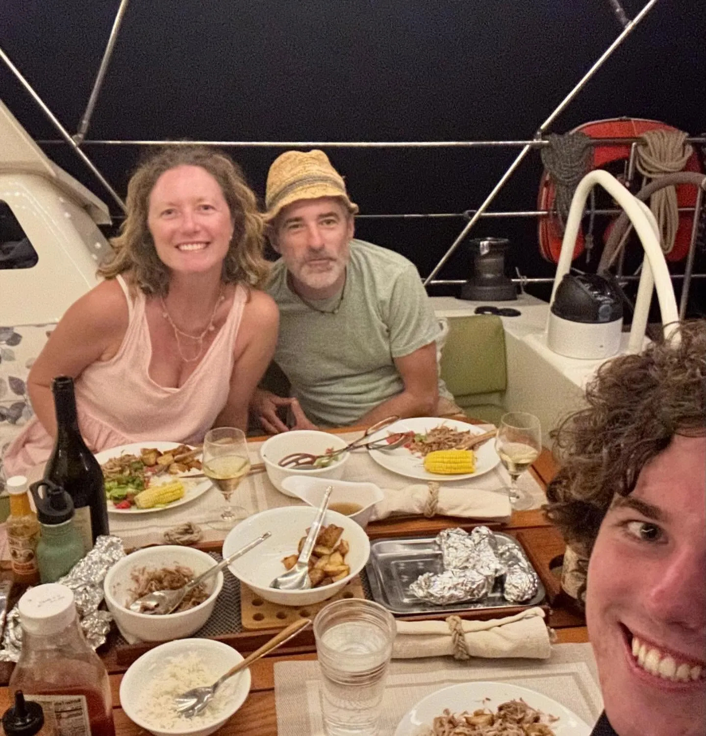 All smiles at dinner in the cockpit. All smiles at dinner in the cockpit.