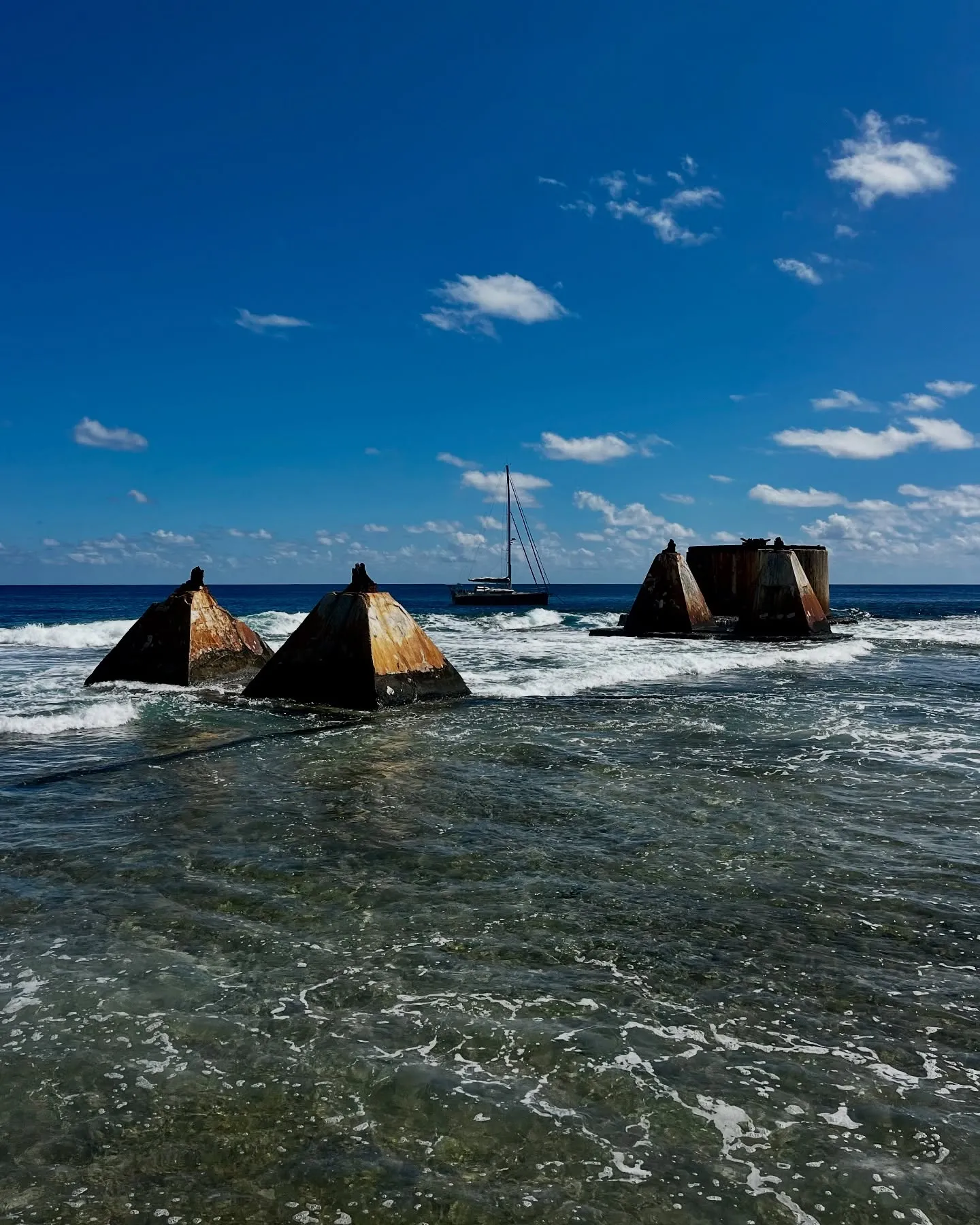 Rusting industrial relics in the shallows. Rusting industrial relics in the shallows.