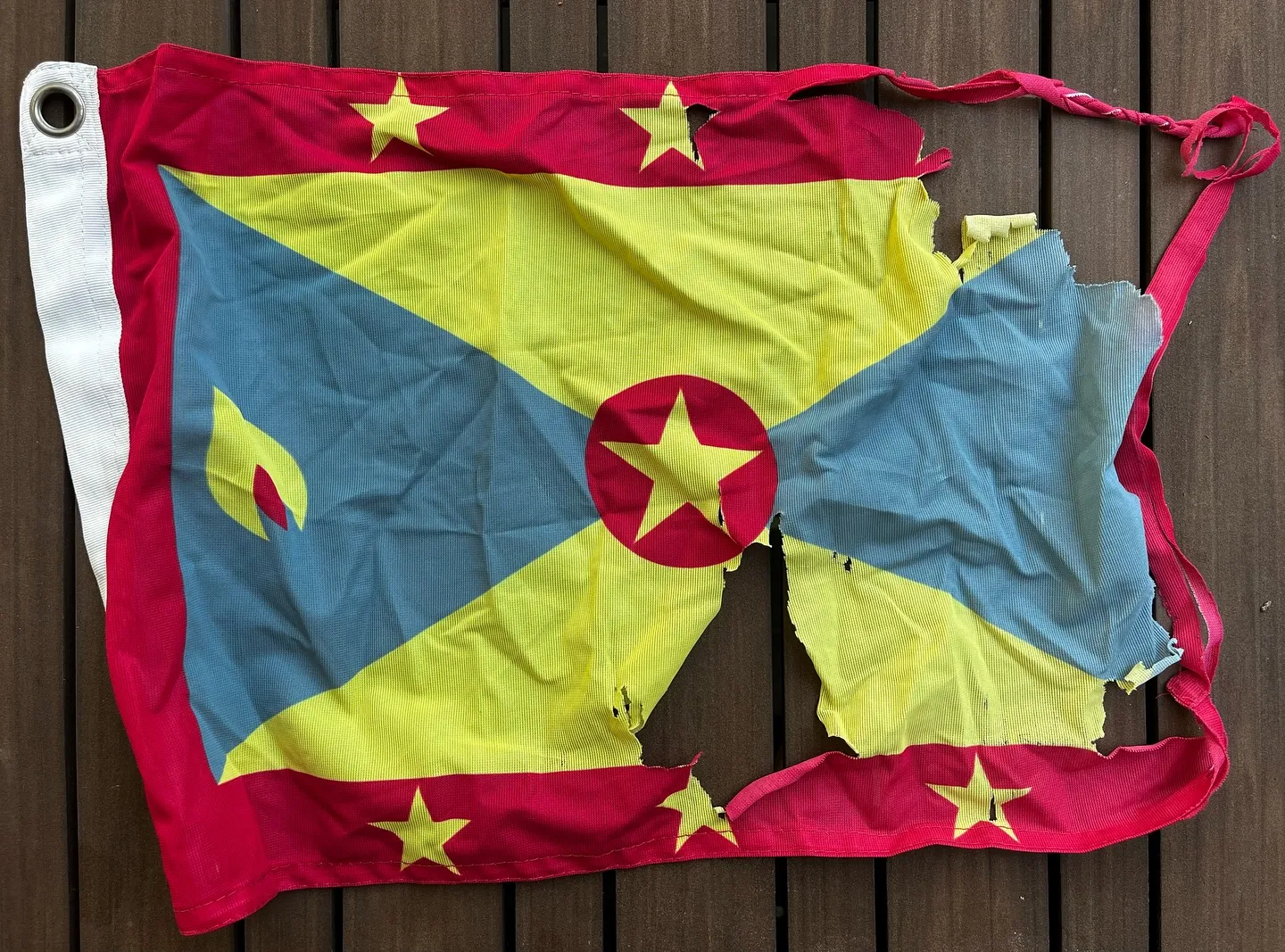 Our battered but proud Grenada courtesy flag. Our battered but proud Grenada courtesy flag.