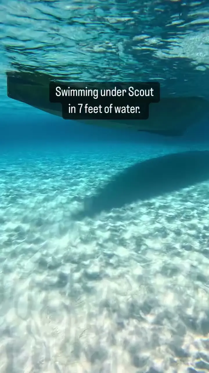 Swimming under Scout in seven feet of water.