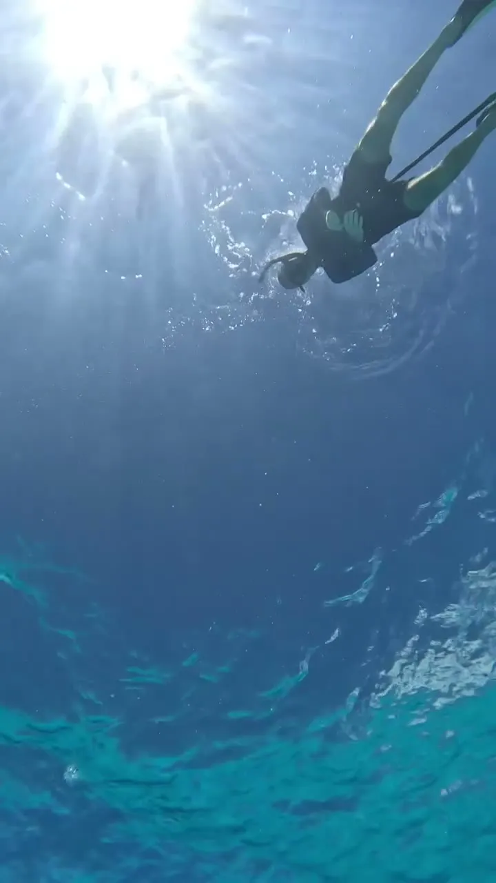 Freediving in the Cayman shallows.