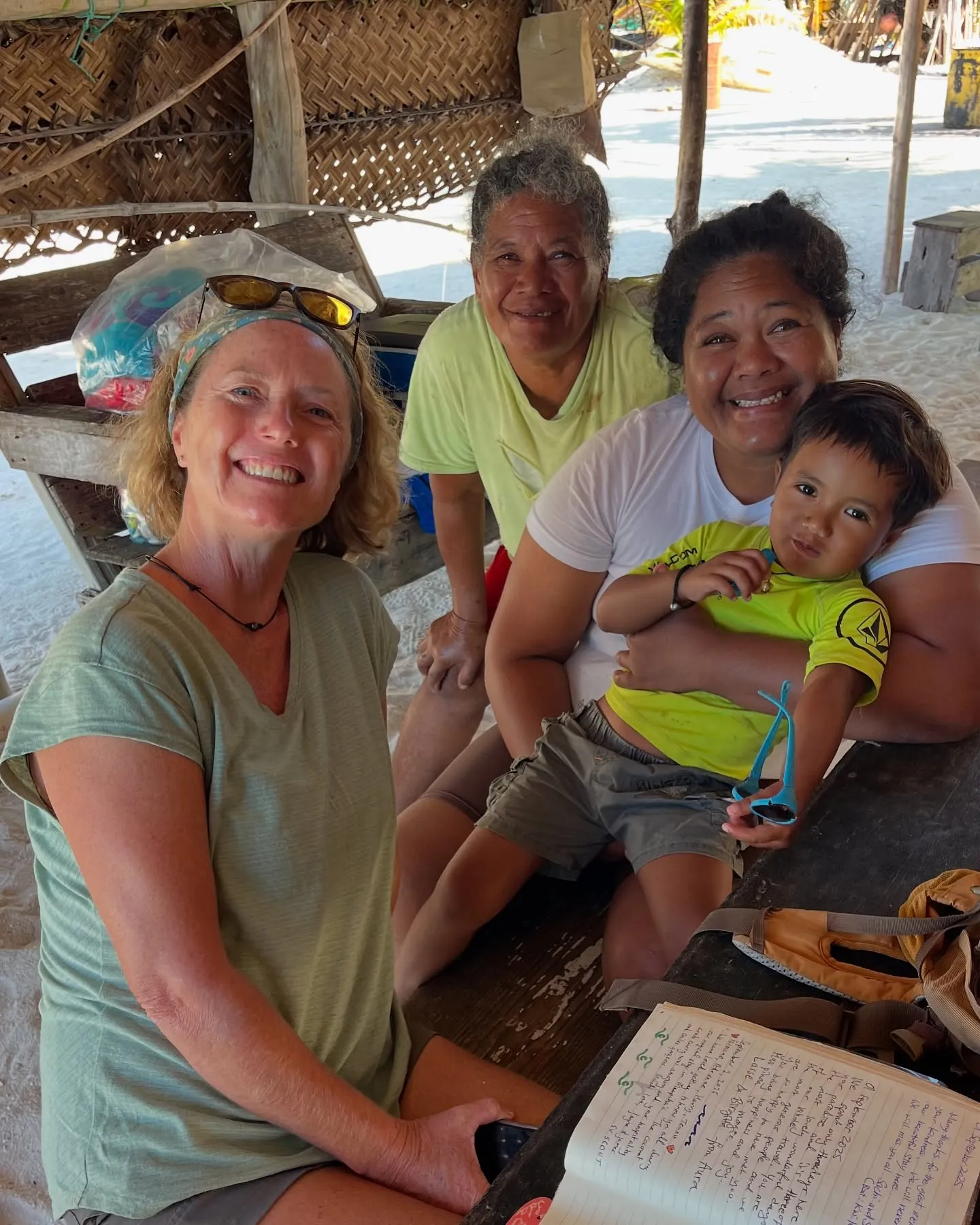 Signing the Maupiha'a visitors' guestbook. Signing the Maupiha'a visitors' guestbook.