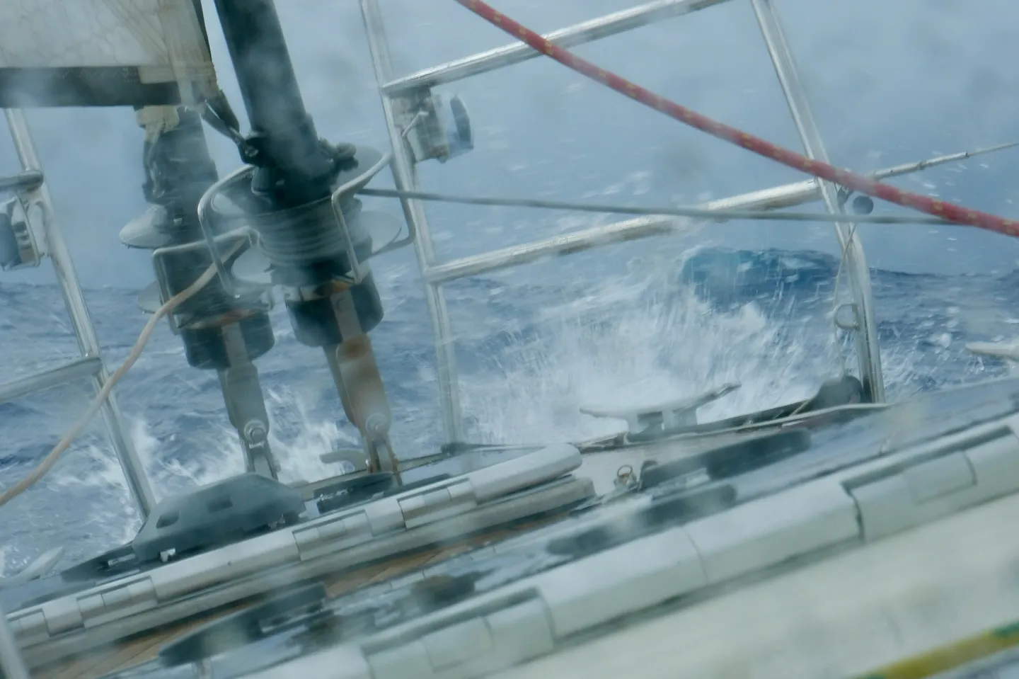 Waves breaking over the foredeck. Waves breaking over the foredeck.