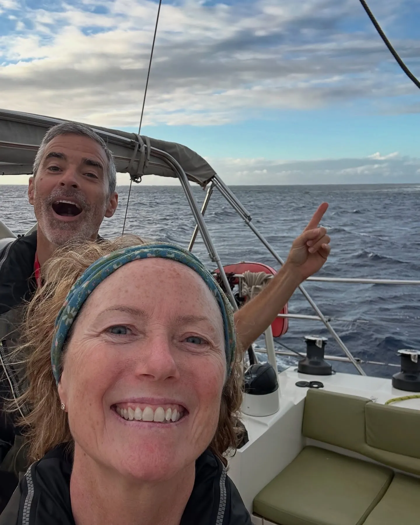 Still smiling, despite the upwind slog. Still smiling, despite the upwind slog.
