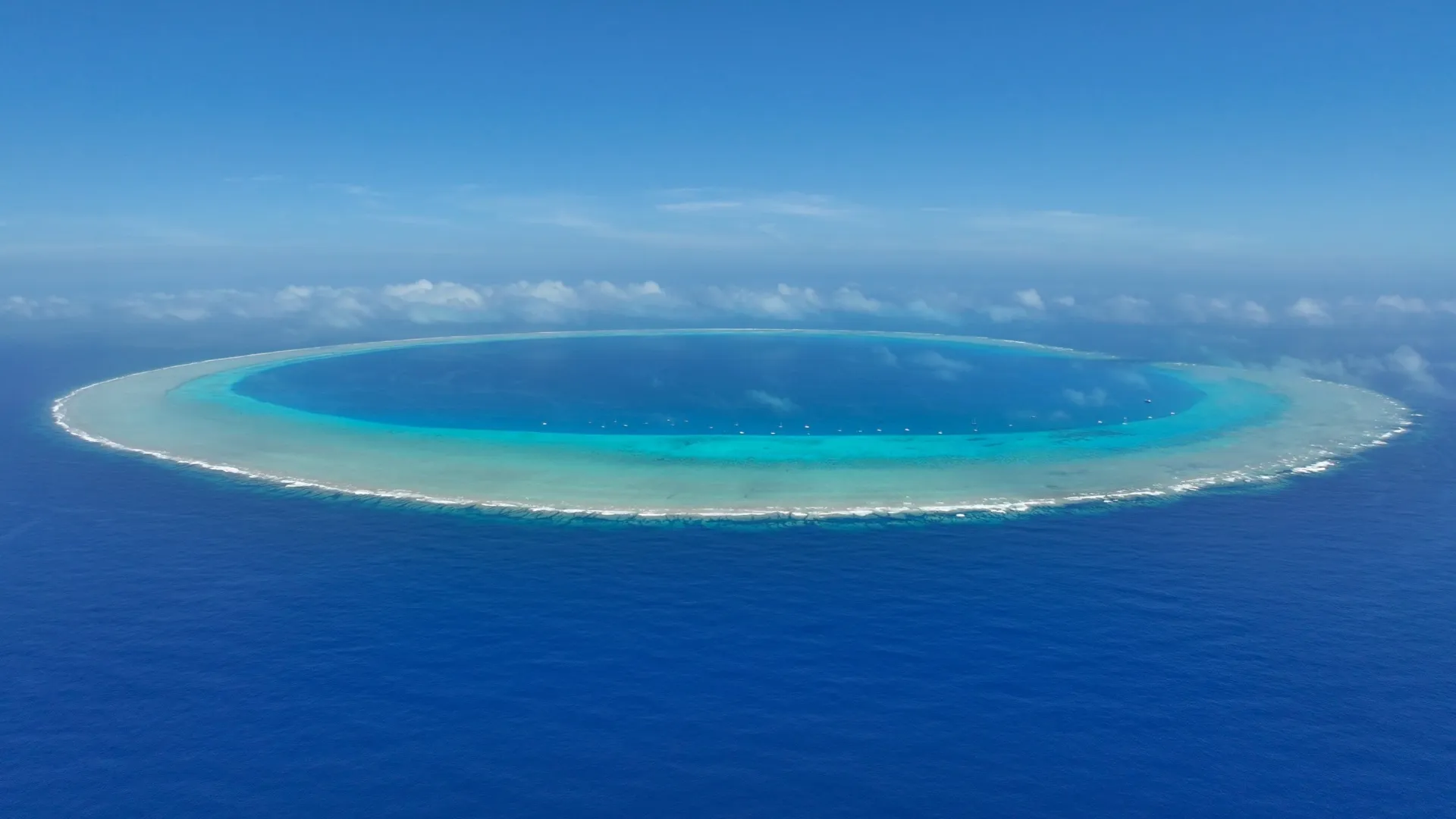 A ring of coral in the middle of nowhere. A ring of coral in the middle of nowhere.