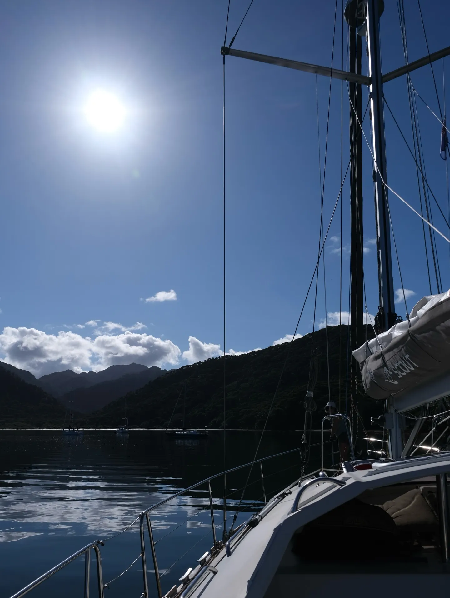 Bright sunshine over a calm anchorage. Bright sunshine over a calm anchorage.