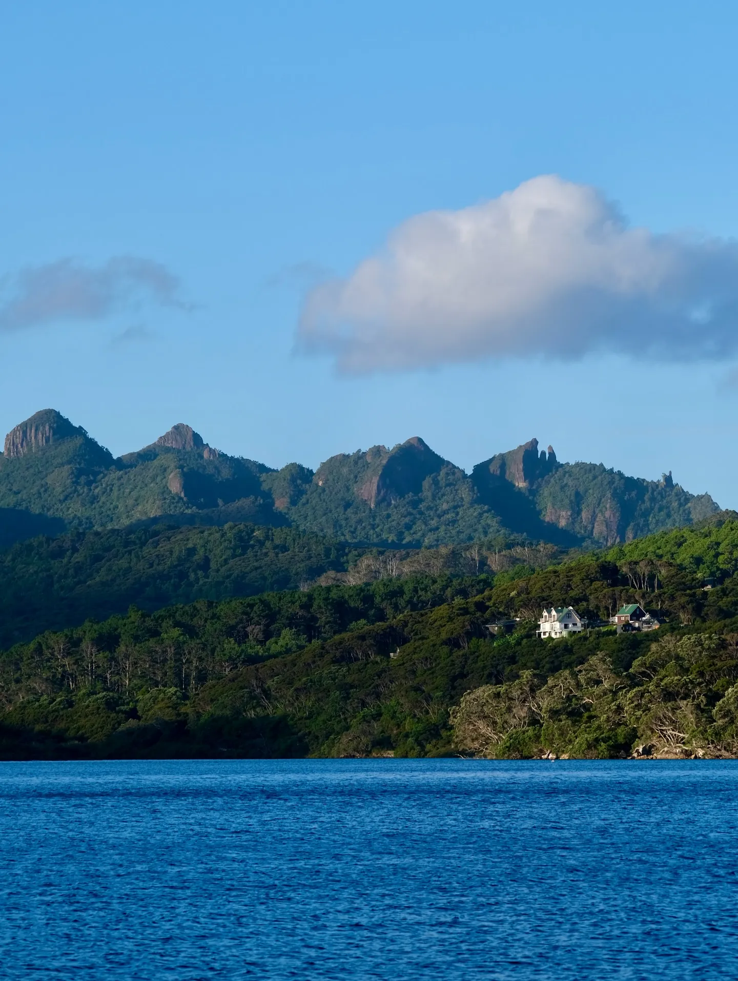 Jagged peaks rising above the bay. Jagged peaks rising above the bay.
