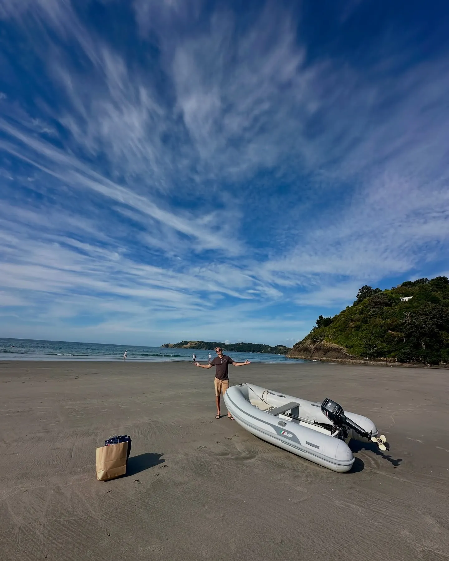 The dinghy on a wide sandy beach. The dinghy on a wide sandy beach.