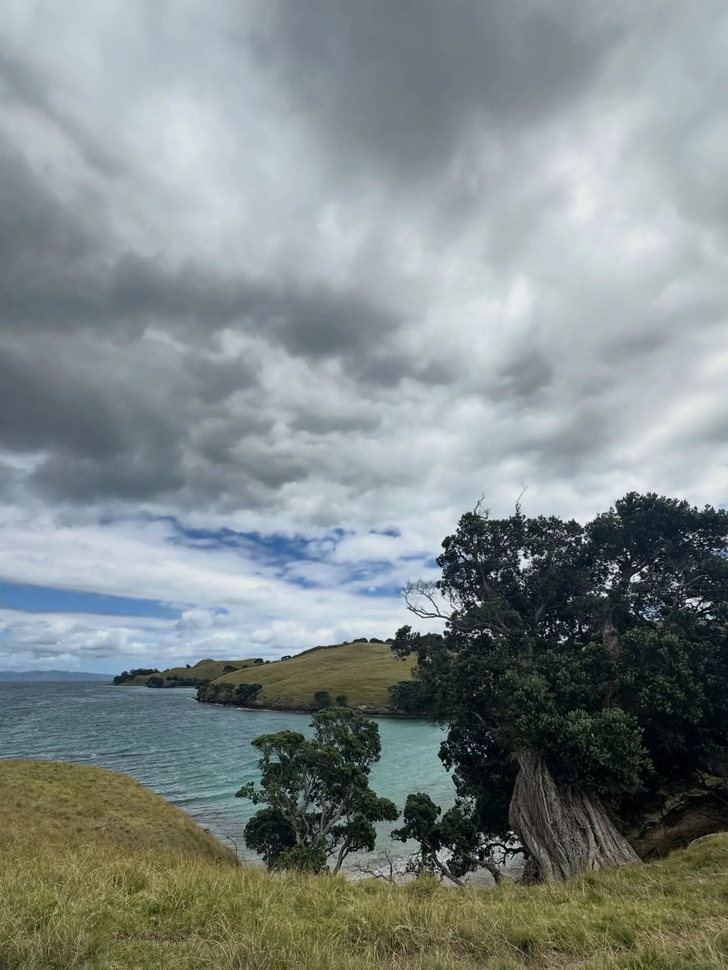 Moody skies over a sheltered bay. Moody skies over a sheltered bay.