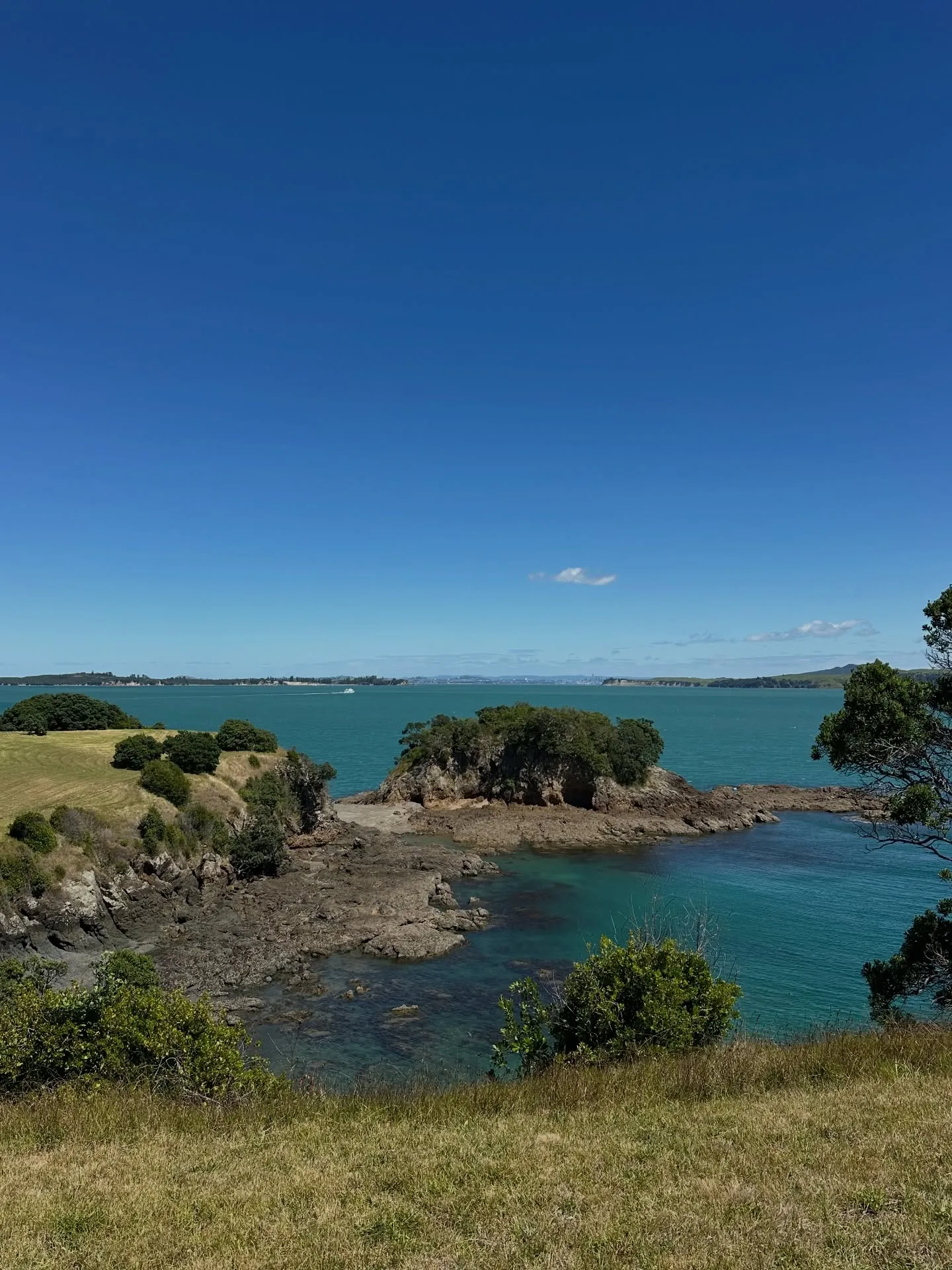 Turquoise water around a rocky islet. Turquoise water around a rocky islet.
