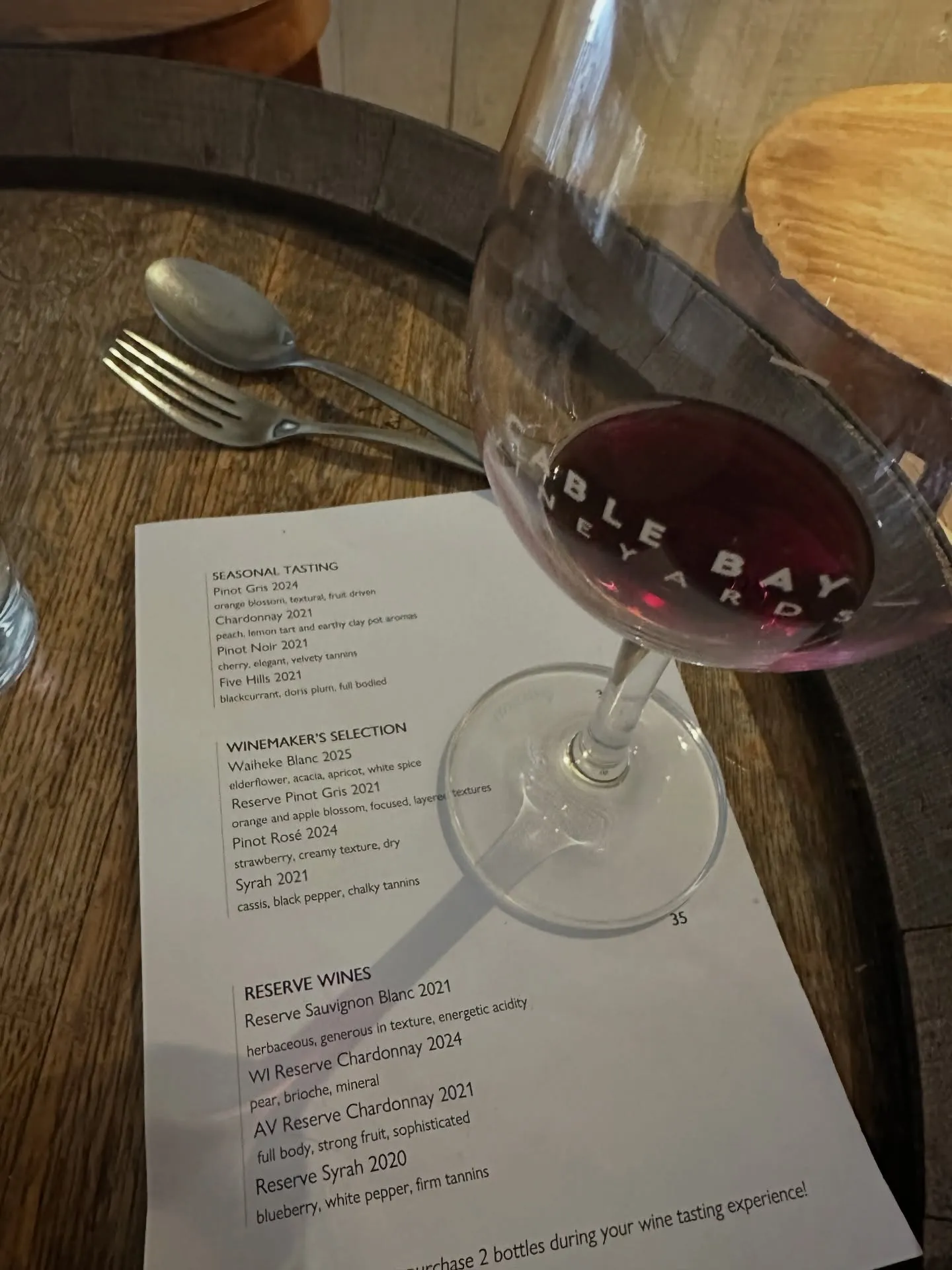 A glass of red at a vineyard tasting. A glass of red at a vineyard tasting.