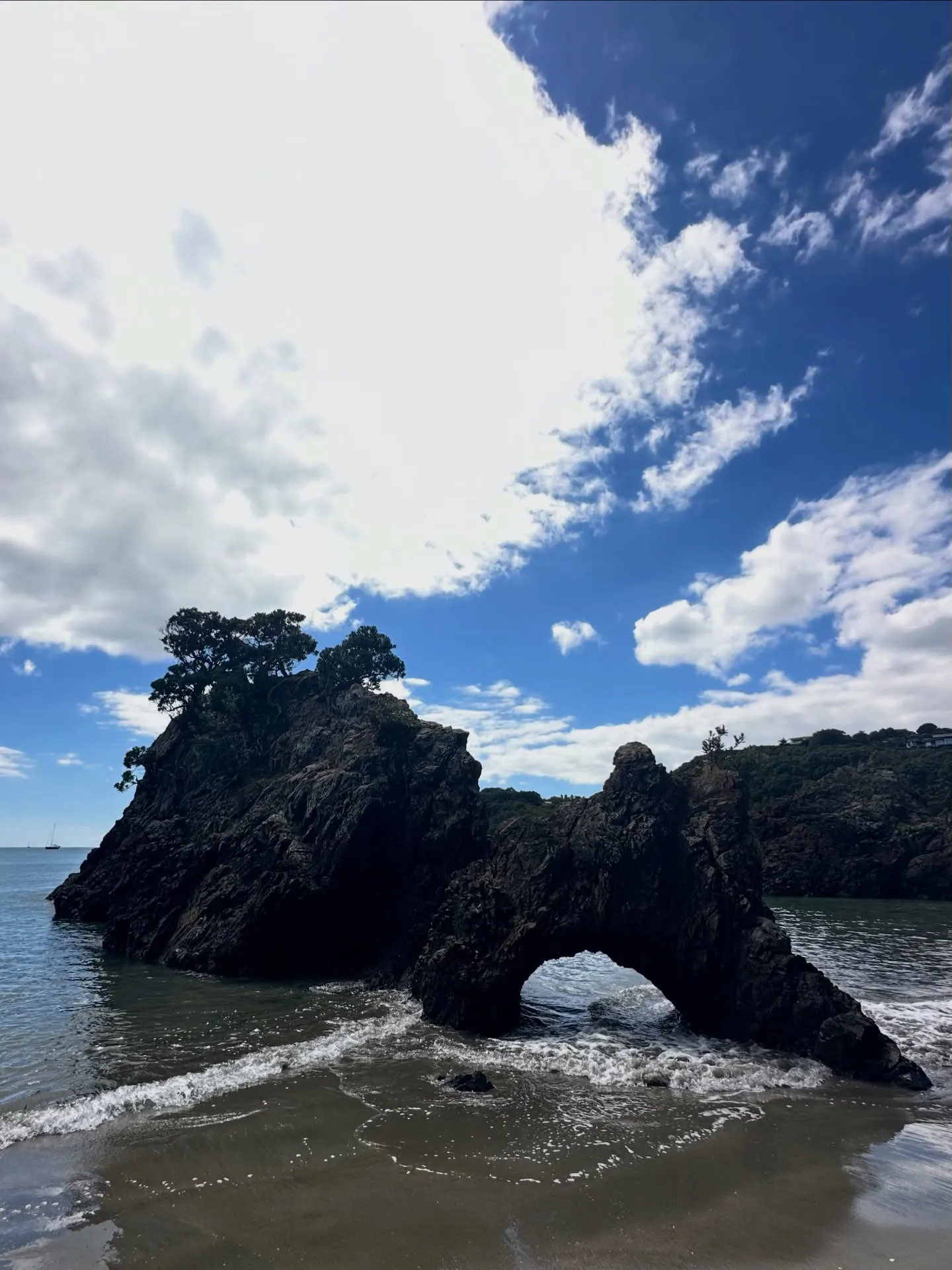 Waves washing through a sea arch. Waves washing through a sea arch.