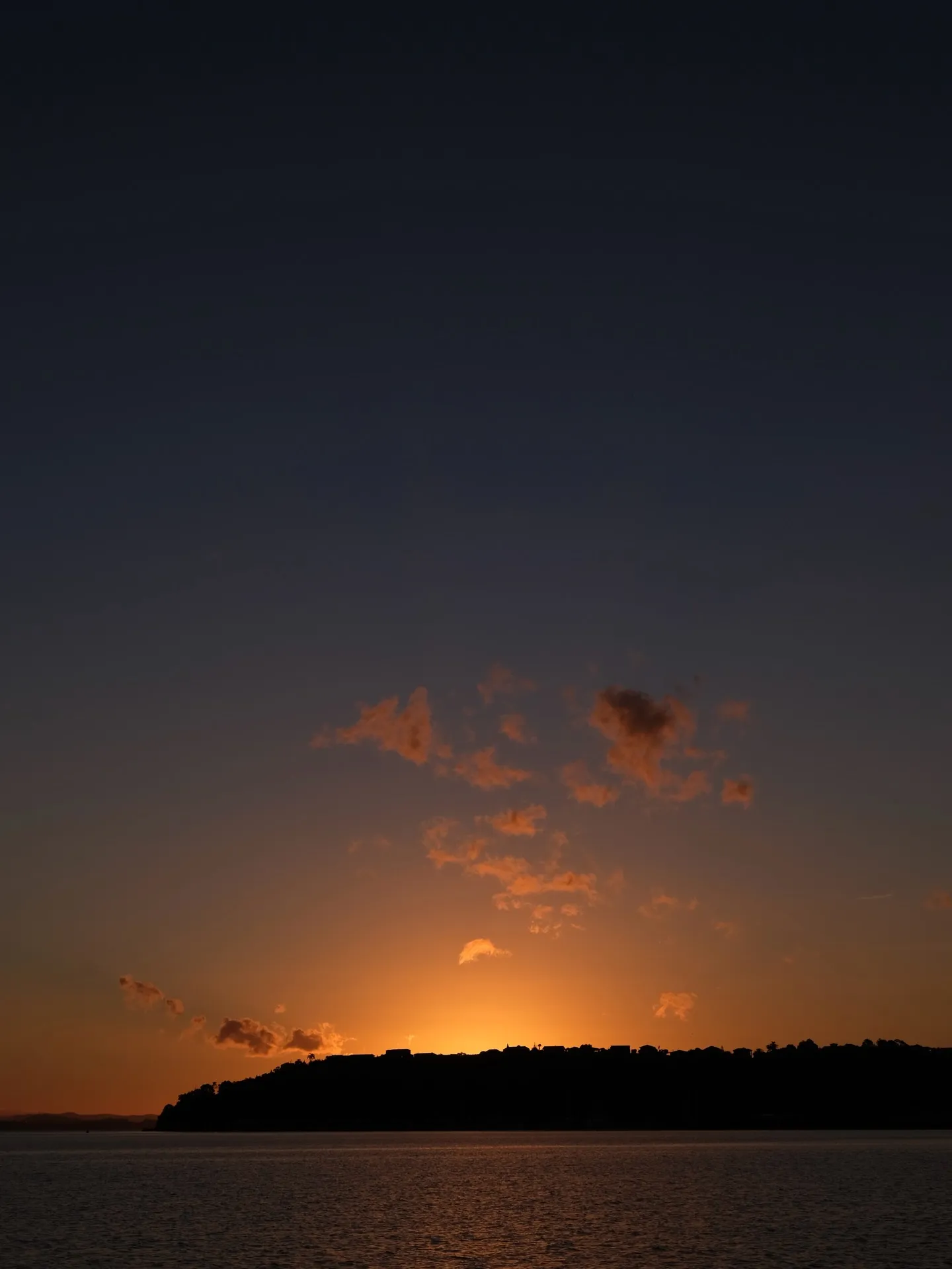 The day ends in orange and gold. The day ends in orange and gold.