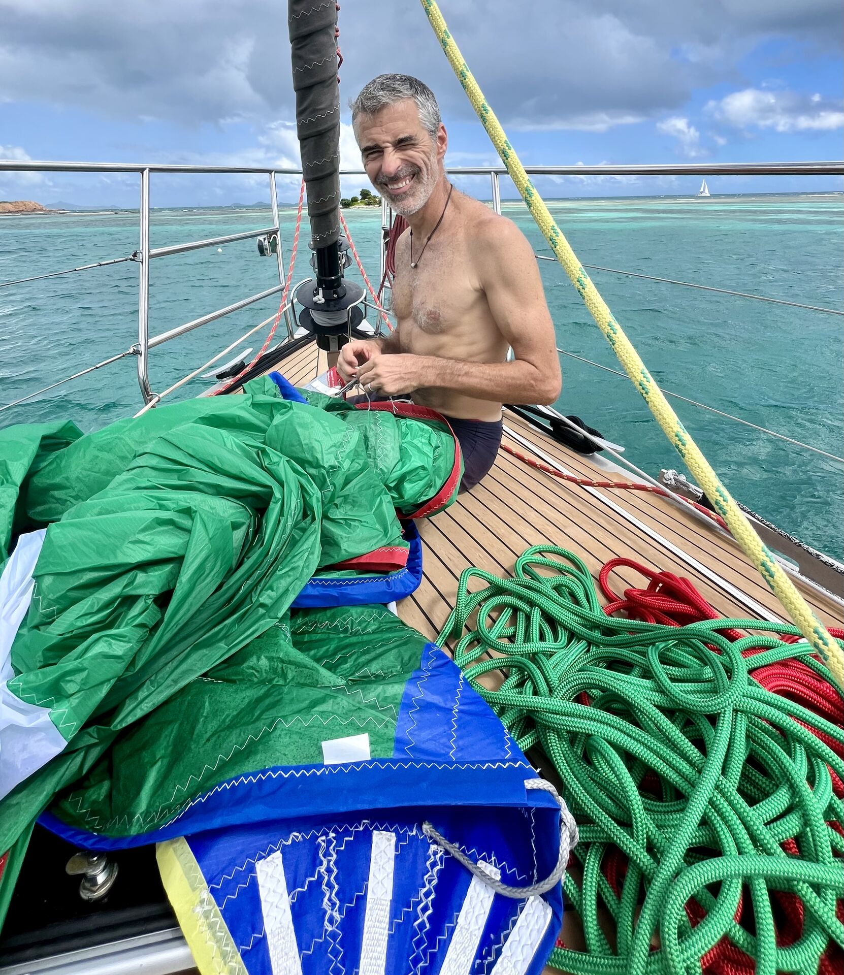 James replaces the dyneema on the spinnaker head.