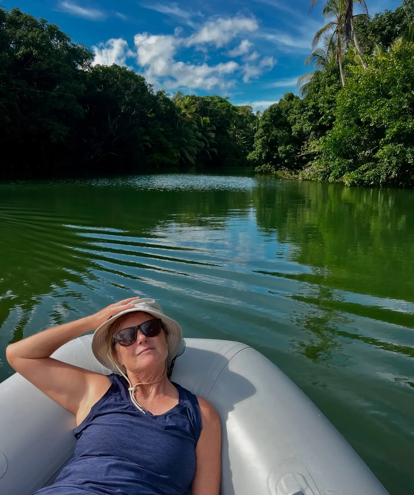 A lazy afternoon drifting downriver by dinghy. A lazy afternoon drifting downriver by dinghy.