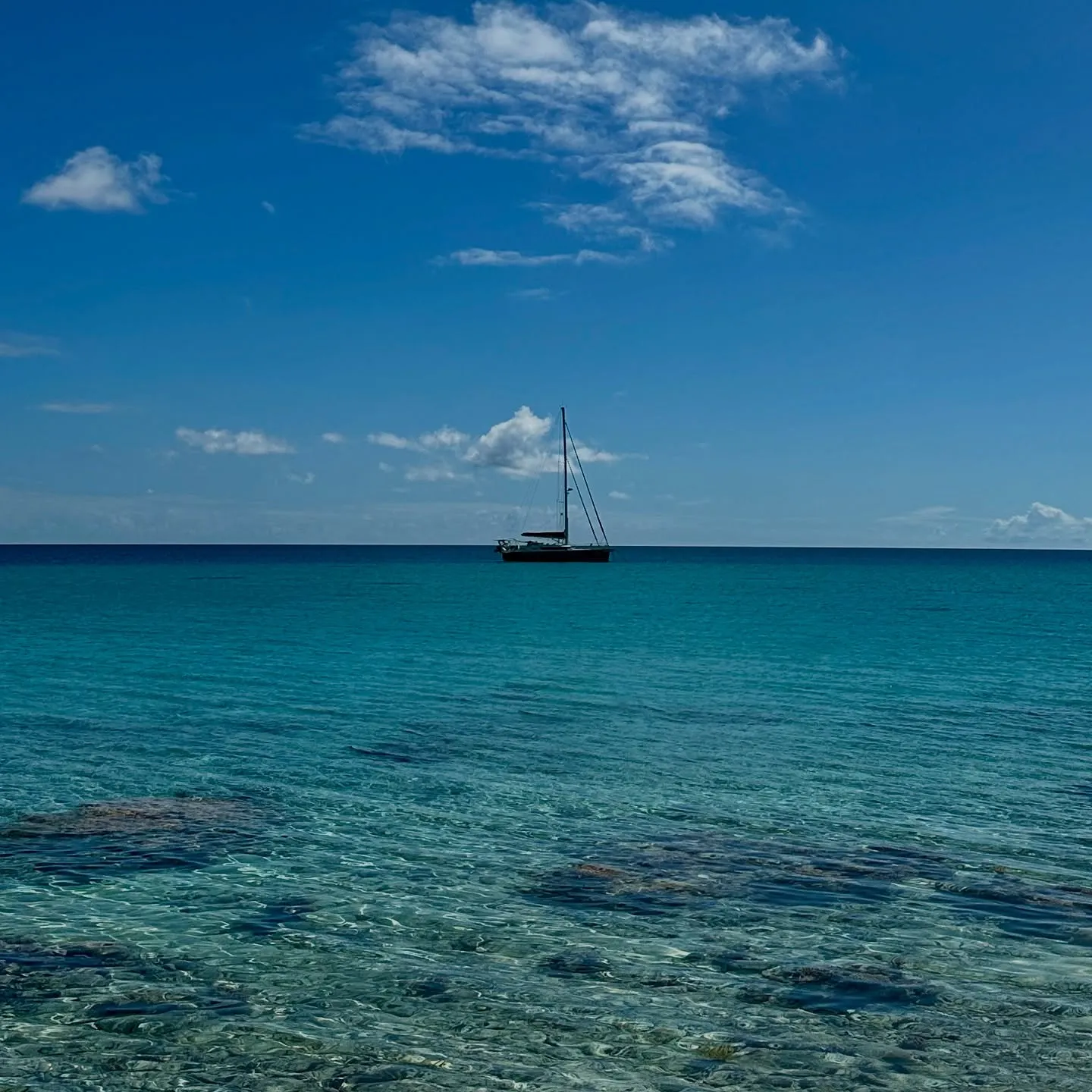 A lone boat in the solitude of the atoll. A lone boat in the solitude of the atoll.